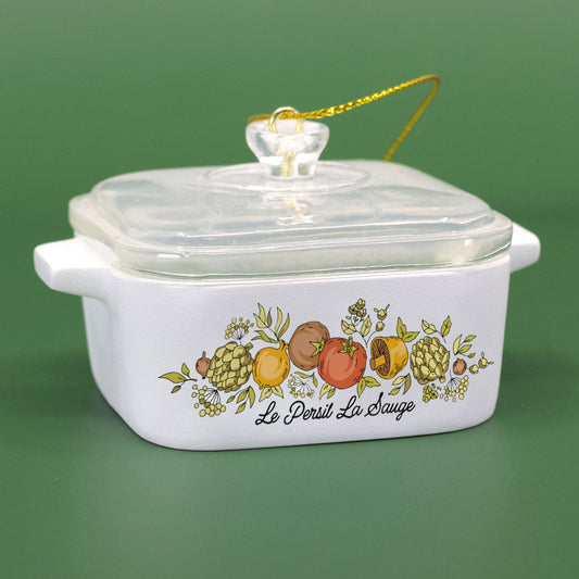 Spice of Life casserole ornament on a green background