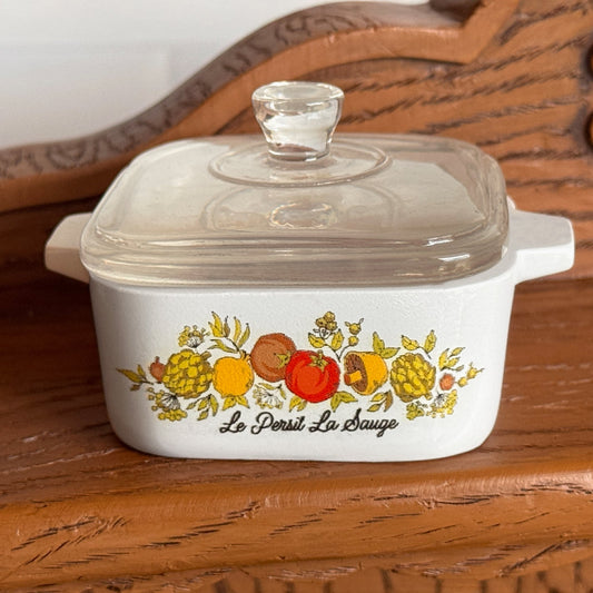 Hand holding the Spice of Life trinket box