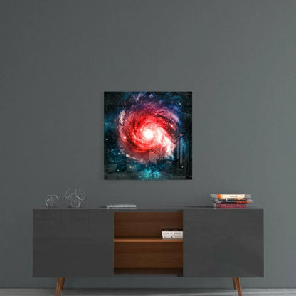 Vibrant red and blue spiral galaxy glass wall art on dark gray wall