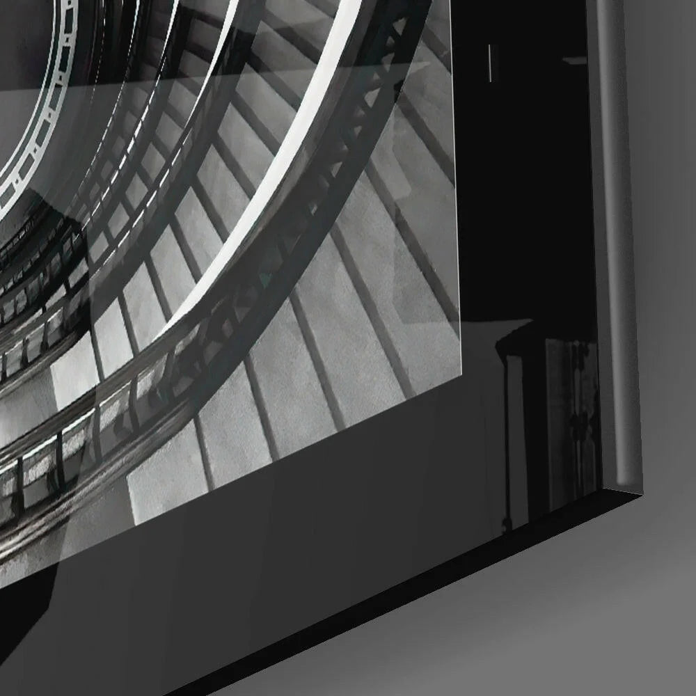 Black-framed black-and-white spiral staircase glass wall art