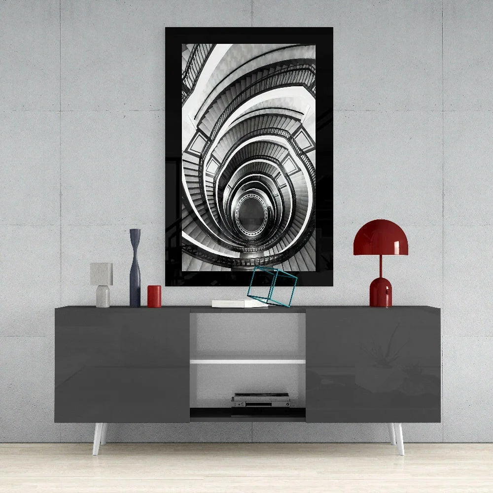 Black-framed black-and-white spiral staircase glass wall art