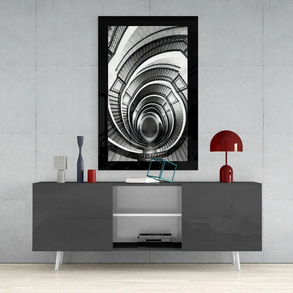 Black-framed black-and-white spiral staircase glass wall art
