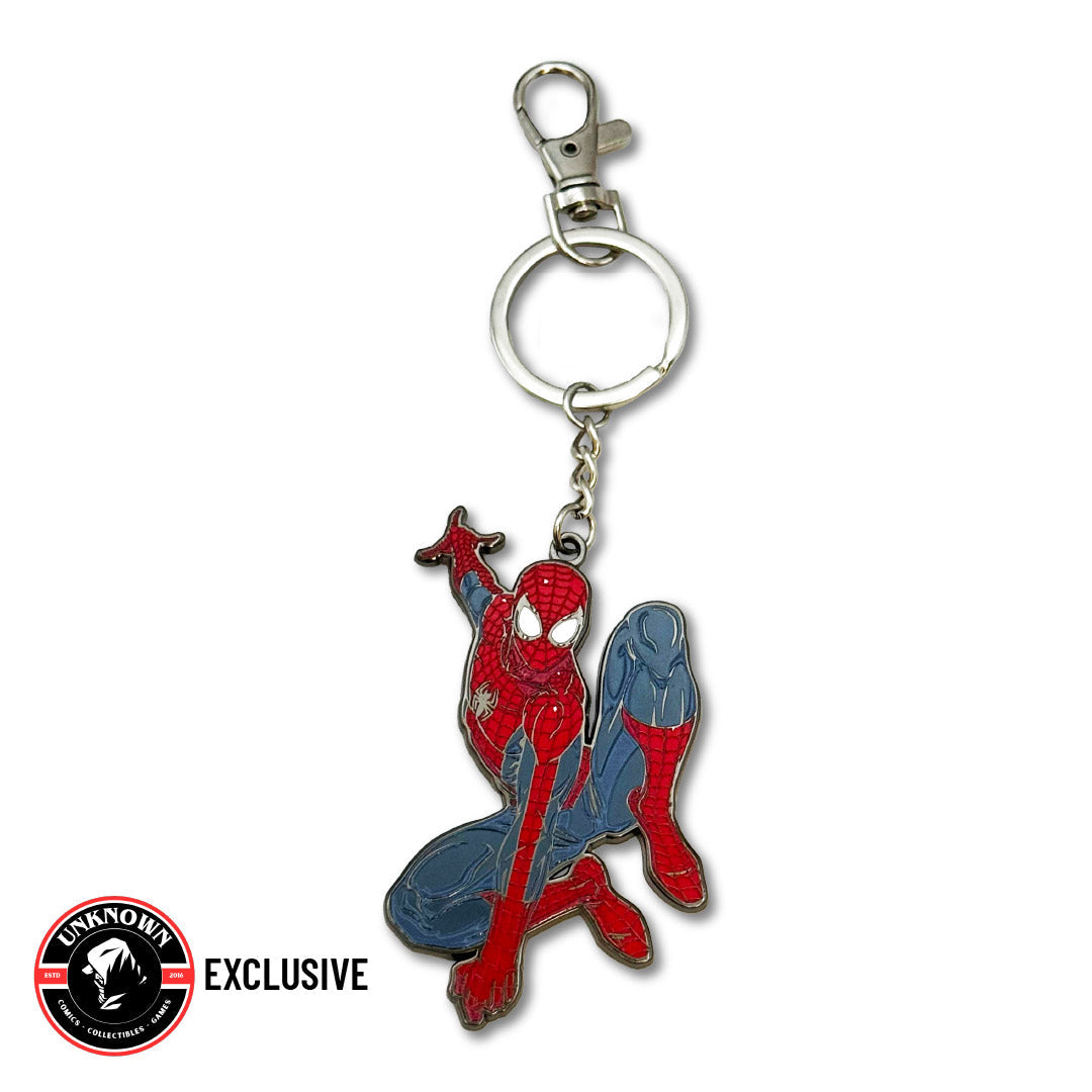 Front view of a red and blue metal Spider-Man keychain on a silver clasp, with an Unknown Exclusive badge at lower left.