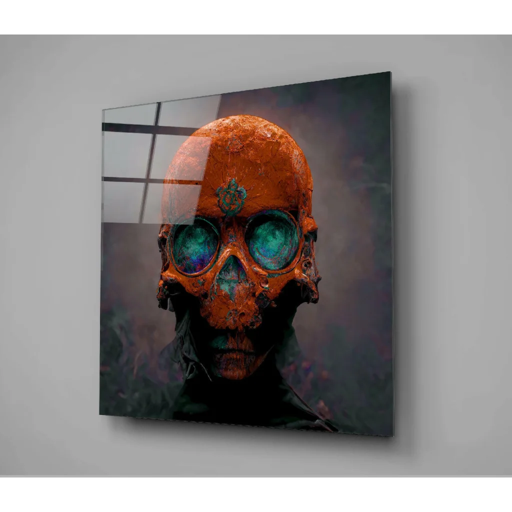 Spooky orange skull glass wall art with green glowing eyes
