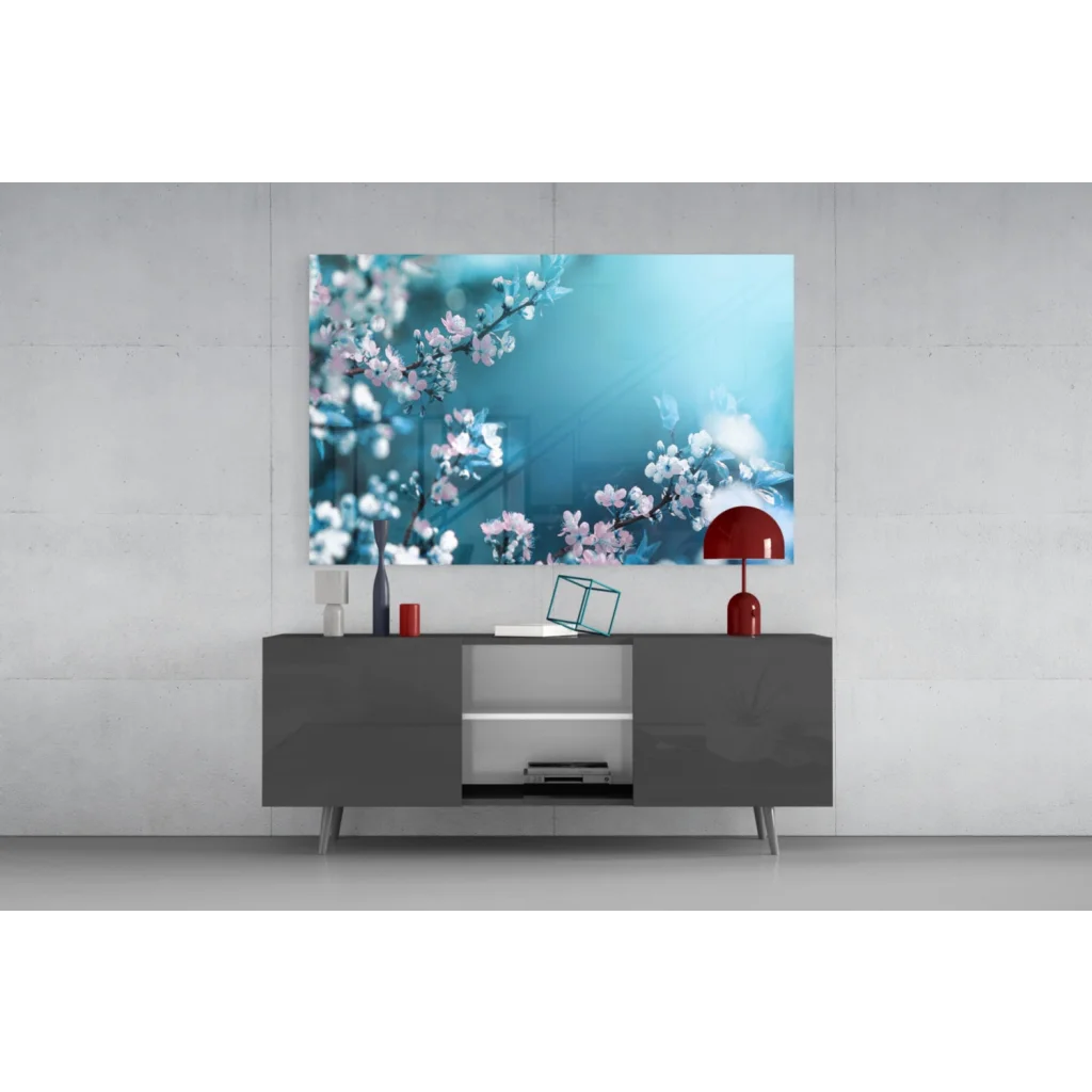 Vibrant cherry blossom wall art print on canvas atop modern gray console