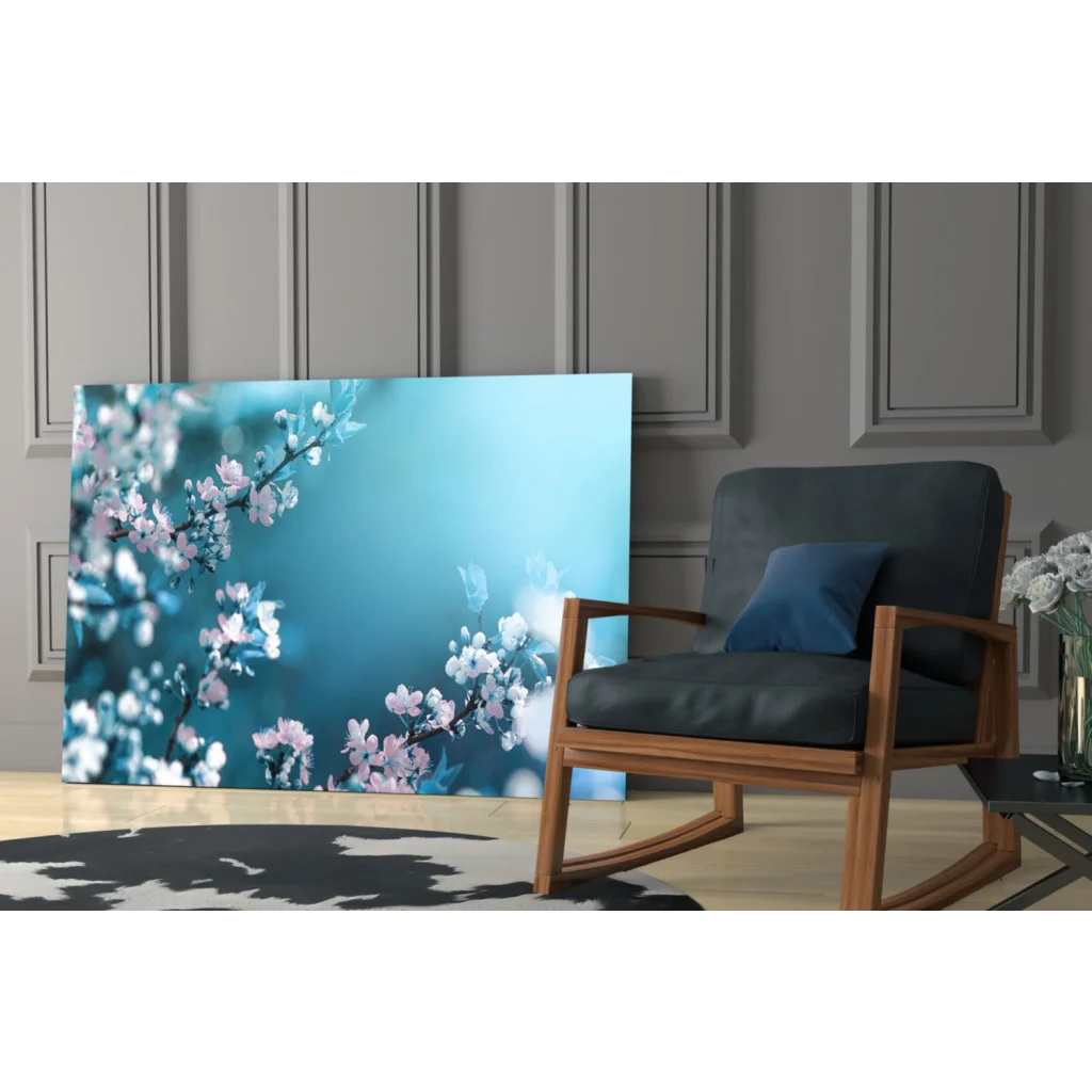 Cherry Blossom canvas wall art print with pink blooms on teal, leaning on paneled wall
