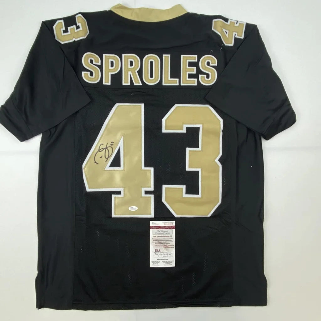 Black custom jersey with gold numbers signed by Sproles, perfect for pro sports fans