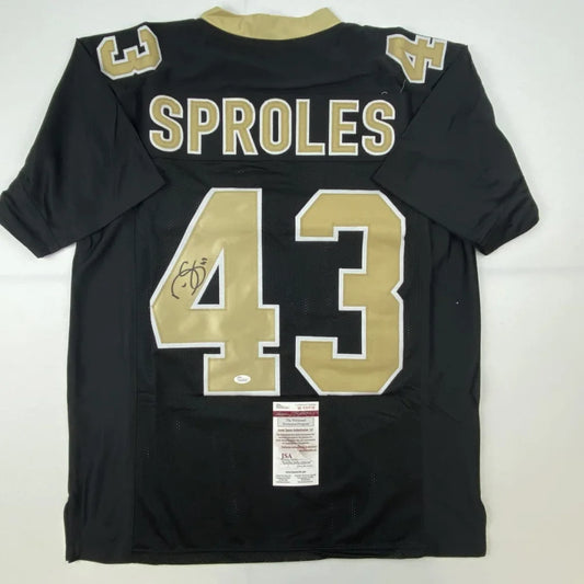 Black custom jersey with gold numbers signed by Sproles, perfect for pro sports fans