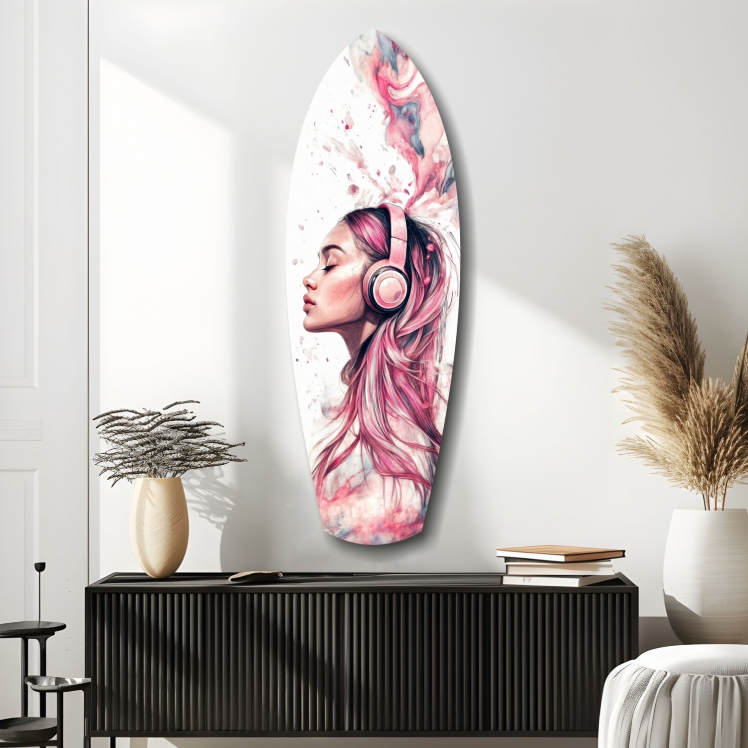 Oval glass wall art featuring a pink-haired woman wearing headphones against a watercolor abstract background, displayed above a black ribbed cabinet.