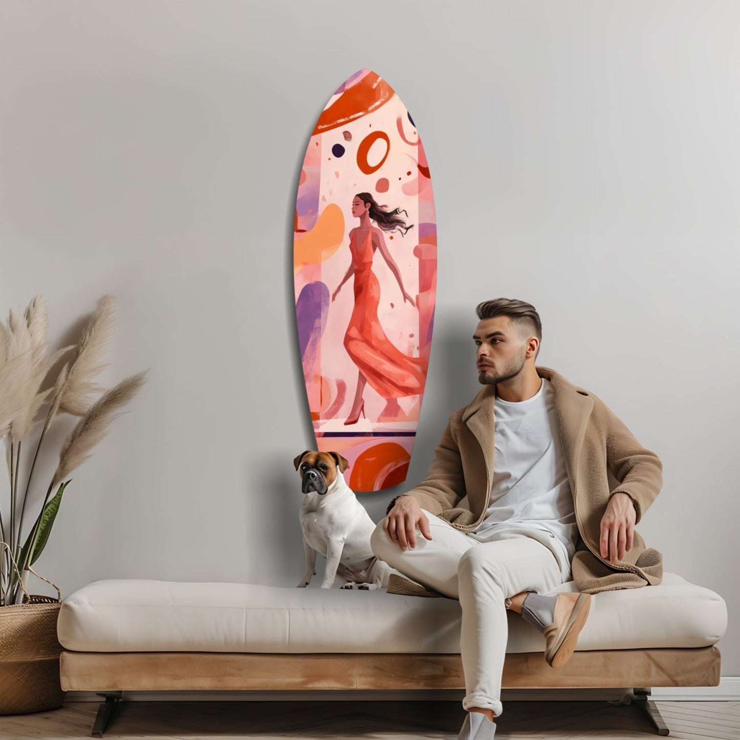 Man sitting on beige sofa with dog beneath colorful glass surfboard wall art featuring woman in red dress and abstract shapes.