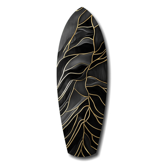 Black surfboard-shaped glass wall art with gold and white veining pattern, displayed against white background.