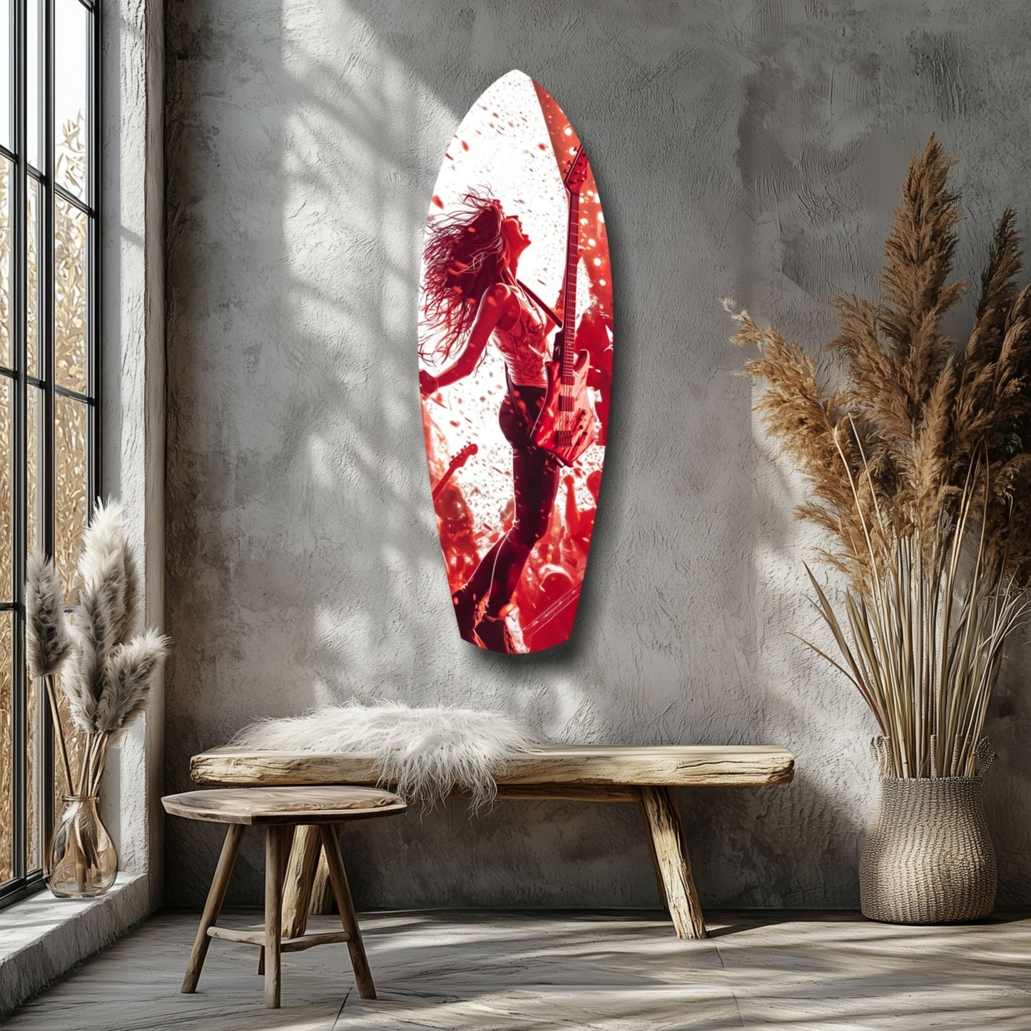Red and white glass surfboard wall art depicting a woman musician with guitar, displayed above wooden bench in minimalist interior with dried grasses.