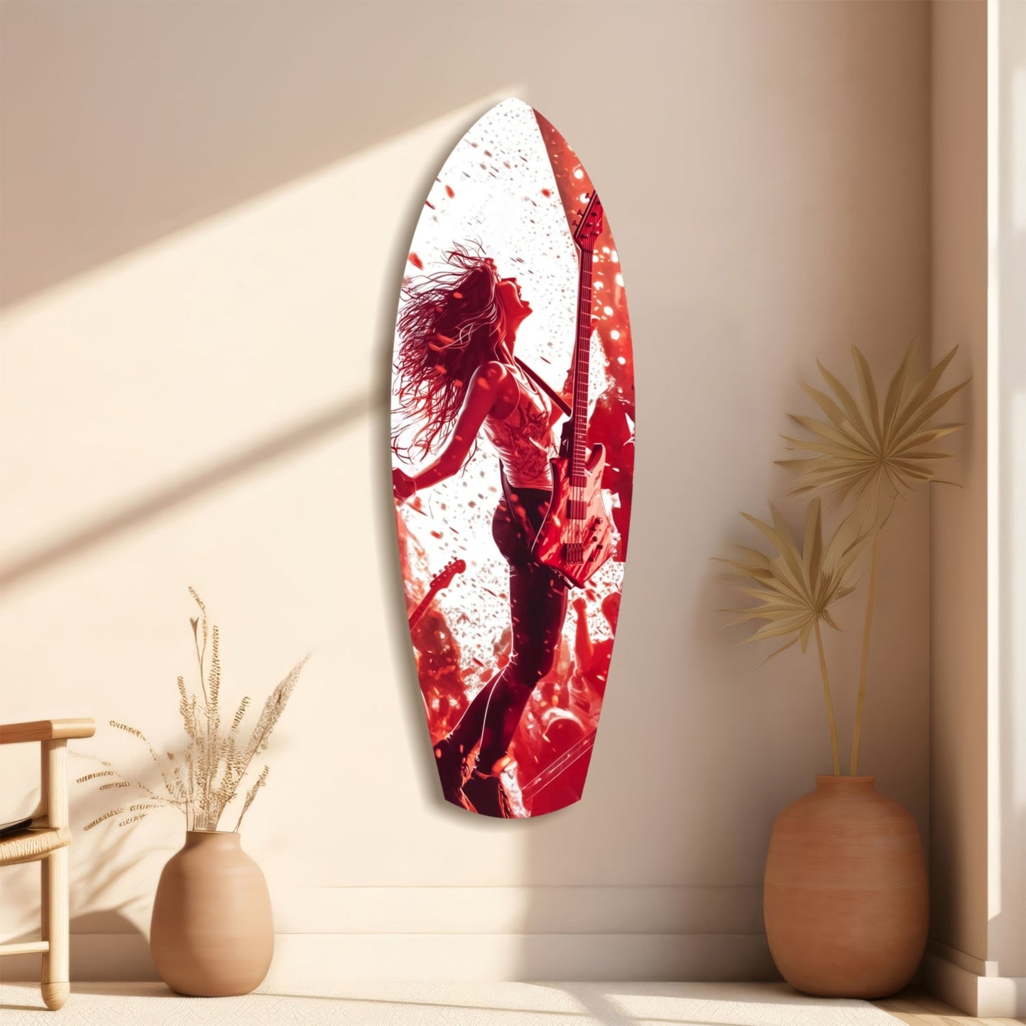 Red and white glass surfboard wall art depicting a musician with guitar, displayed on a beige wall with decorative vases and dried plants.