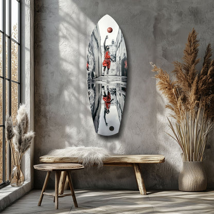Oval white glass wall art displaying black and red street basketball player shooting, mounted above wooden bench in minimalist interior.