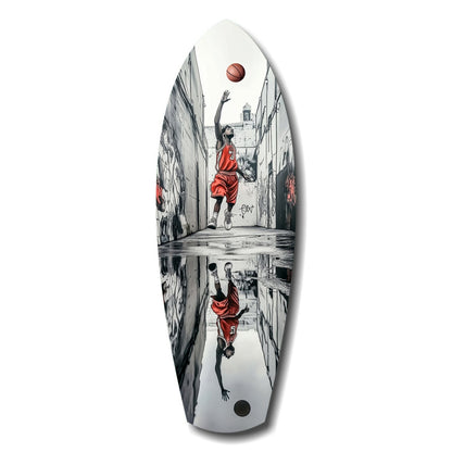 Oval glass wall art depicting a basketball player in red shooting upward in a narrow alleyway, with reflection below.