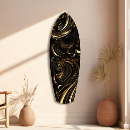 Black and gold swirled glass wall art displayed vertically on cream wall between terracotta vases with dried grasses.