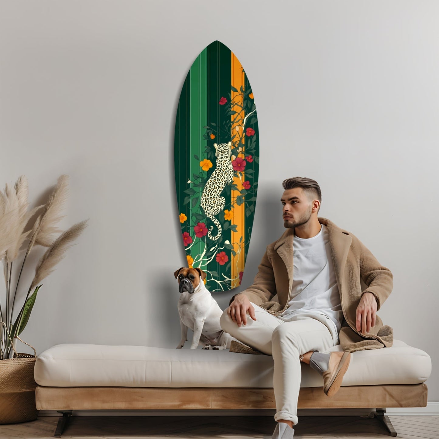 Man sitting on bench with dog beside green and gold surfboard-shaped wall art featuring white leopard and colorful flowers.