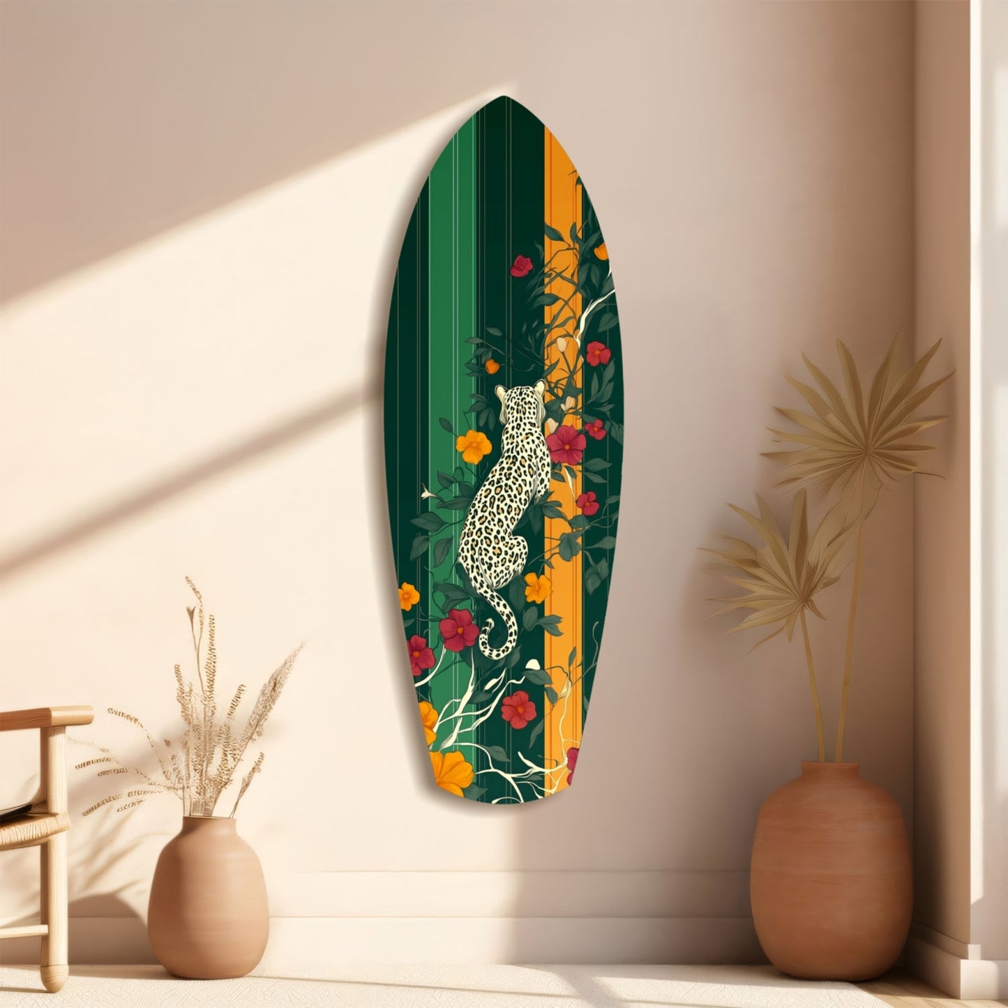Oval glass wall art featuring a white spotted leopard climbing among colorful orange and red flowers on green background, displayed on beige wall with dried plants.