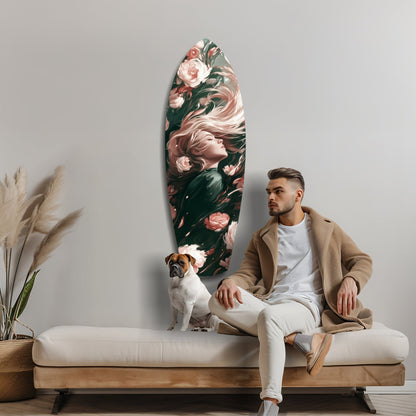 Man and dog sitting on cream bench below oval glass wall art featuring woman's profile with pink roses and dark foliage.