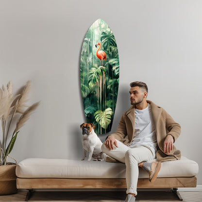 Man and dog sitting on cream bench beside oval glass wall art depicting flamingo among green tropical plants.
