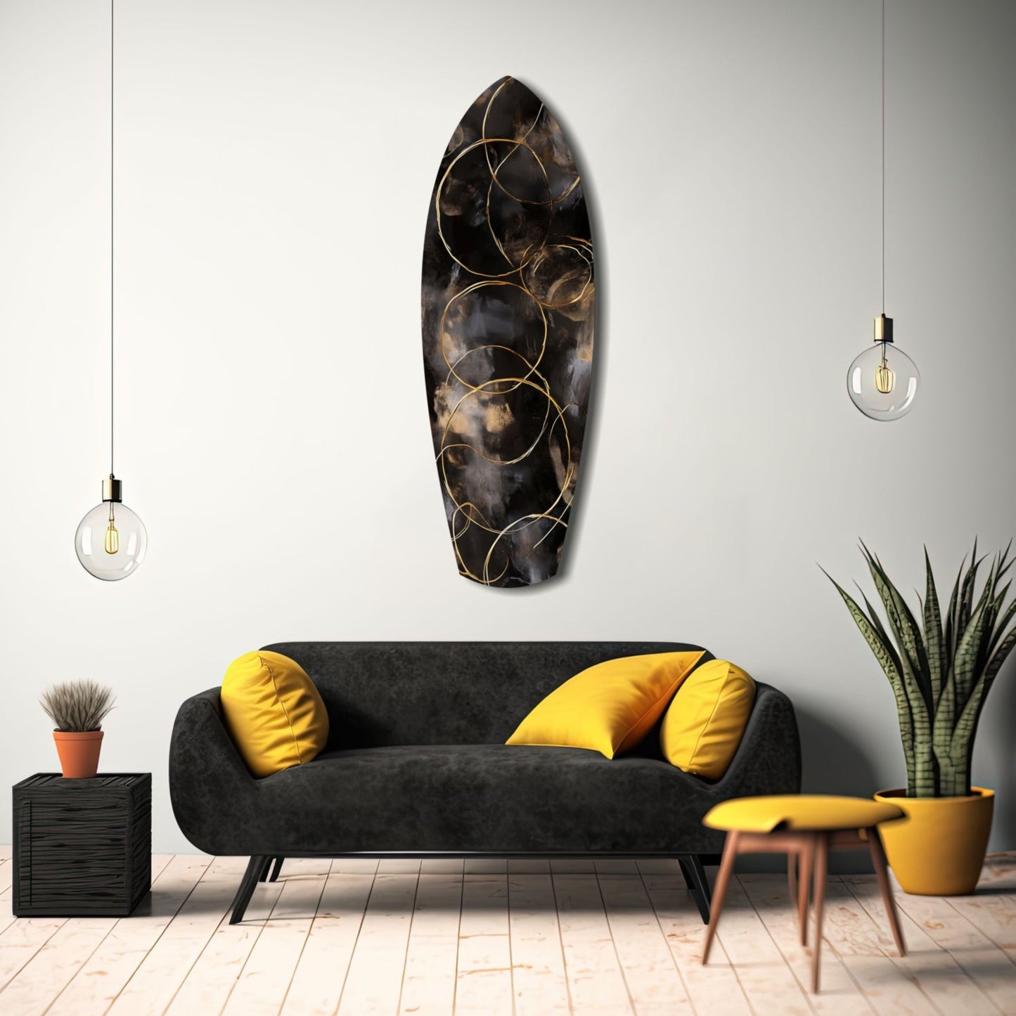 Black glass wall art with gold circular line patterns displayed above a charcoal sofa with yellow pillows in a modern living room setting.