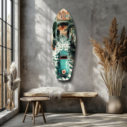 Turquoise vintage car glass wall art mounted on gray textured wall above wooden bench in minimalist interior with pampas grass and window.
