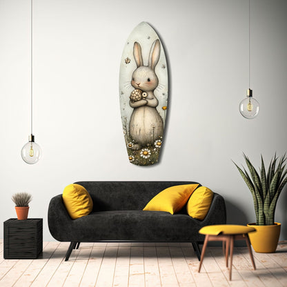 Cute rabbit glass wall art displayed above a black sofa with yellow pillows in a modern living room setting.