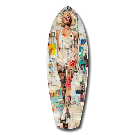 Surfboard-shaped wall art featuring a blonde pin-up figure composed of collaged newspaper and colorful magazine clippings on white background.