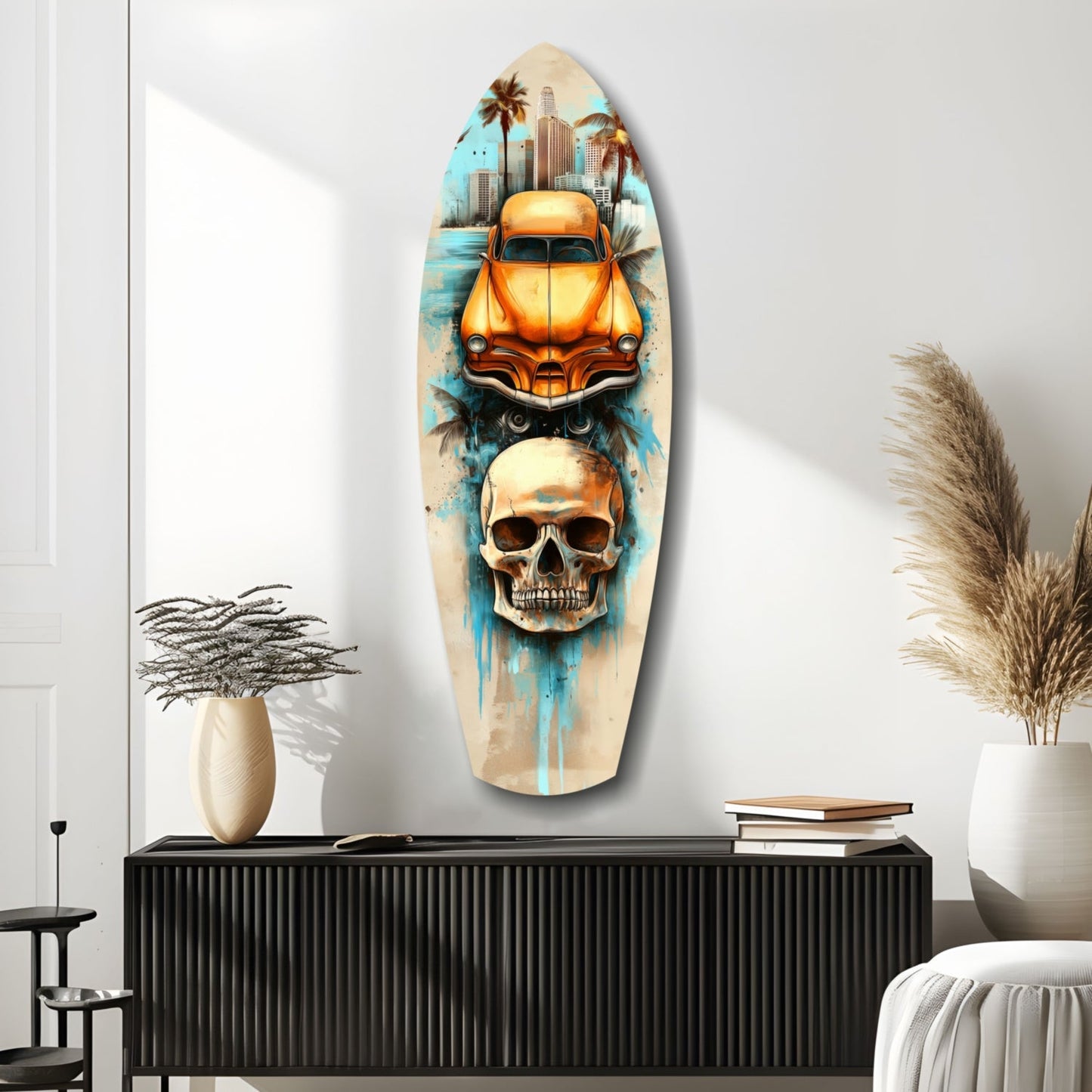 Surfboard-shaped glass wall art featuring an orange vintage car, skull, and blue cityscape with palm trees, displayed on a black cabinet in a modern room.