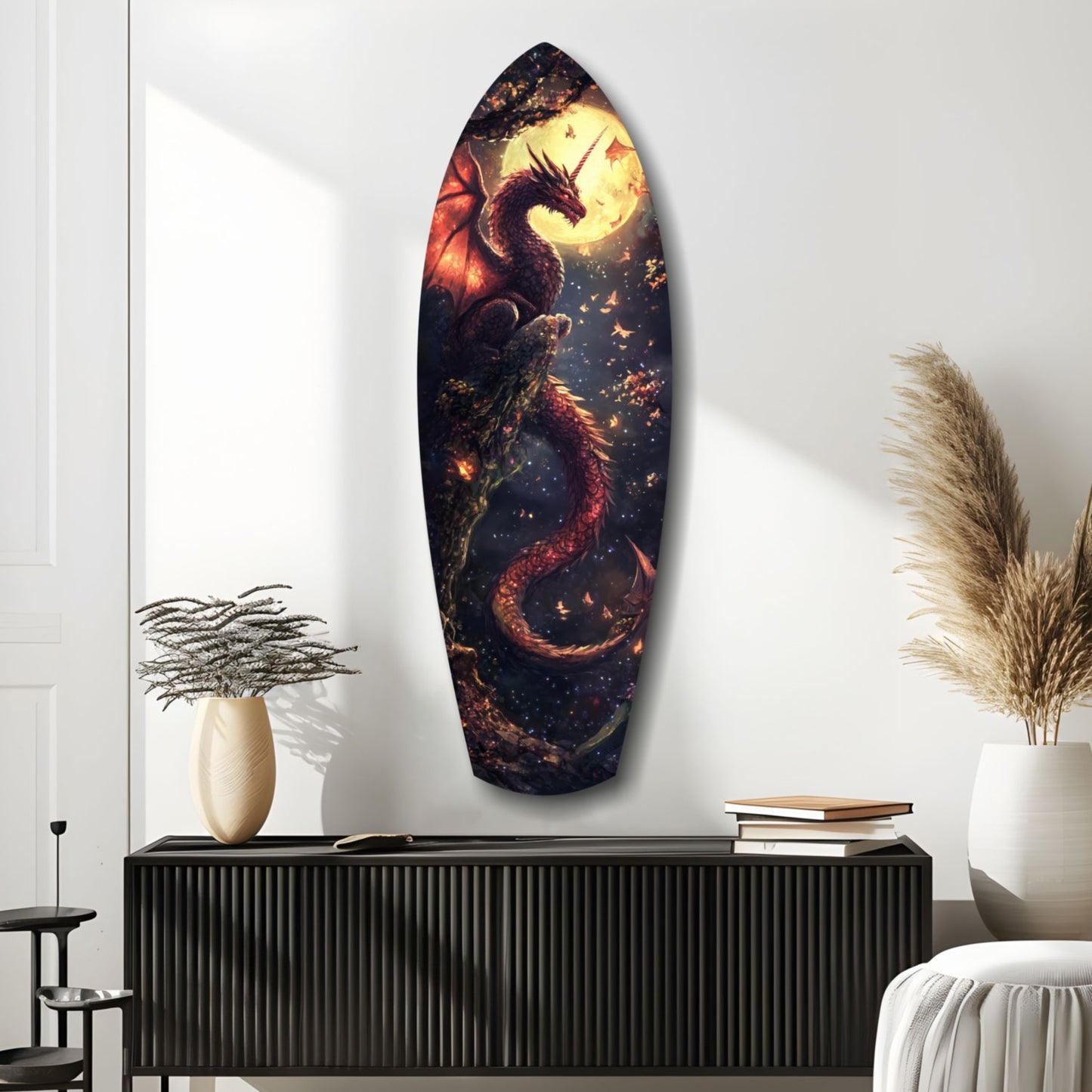 Oval glass wall art depicting a red and gold dragon against a dark sky with moon, displayed above a black ridged cabinet in a minimalist room setting.