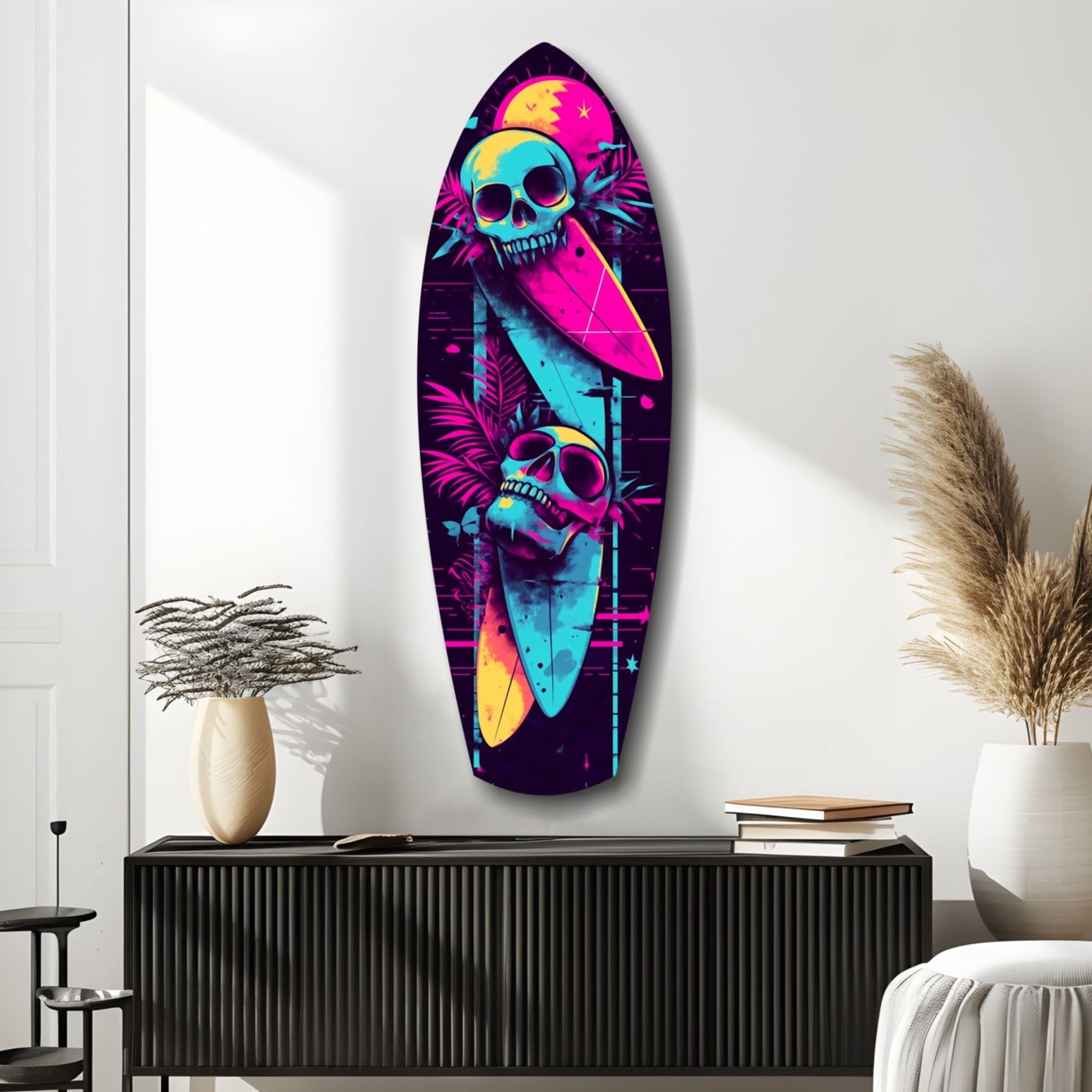 Neon surfboard-shaped glass wall art with colorful skulls and tropical patterns displayed above a black ribbed console table in a modern interior setting.
