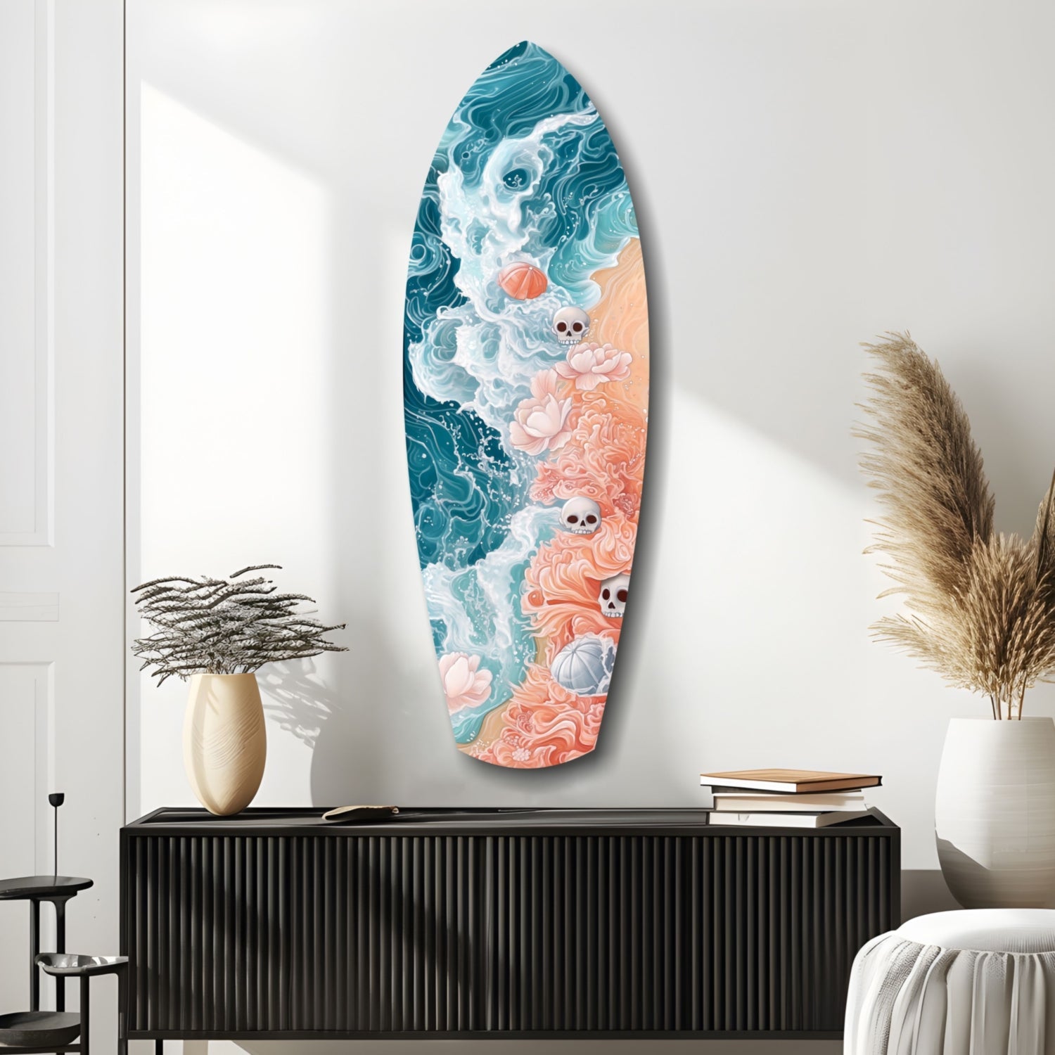 Surfboard-shaped glass wall art featuring teal waves, coral sand, and white skulls displayed above black console table in minimalist interior.