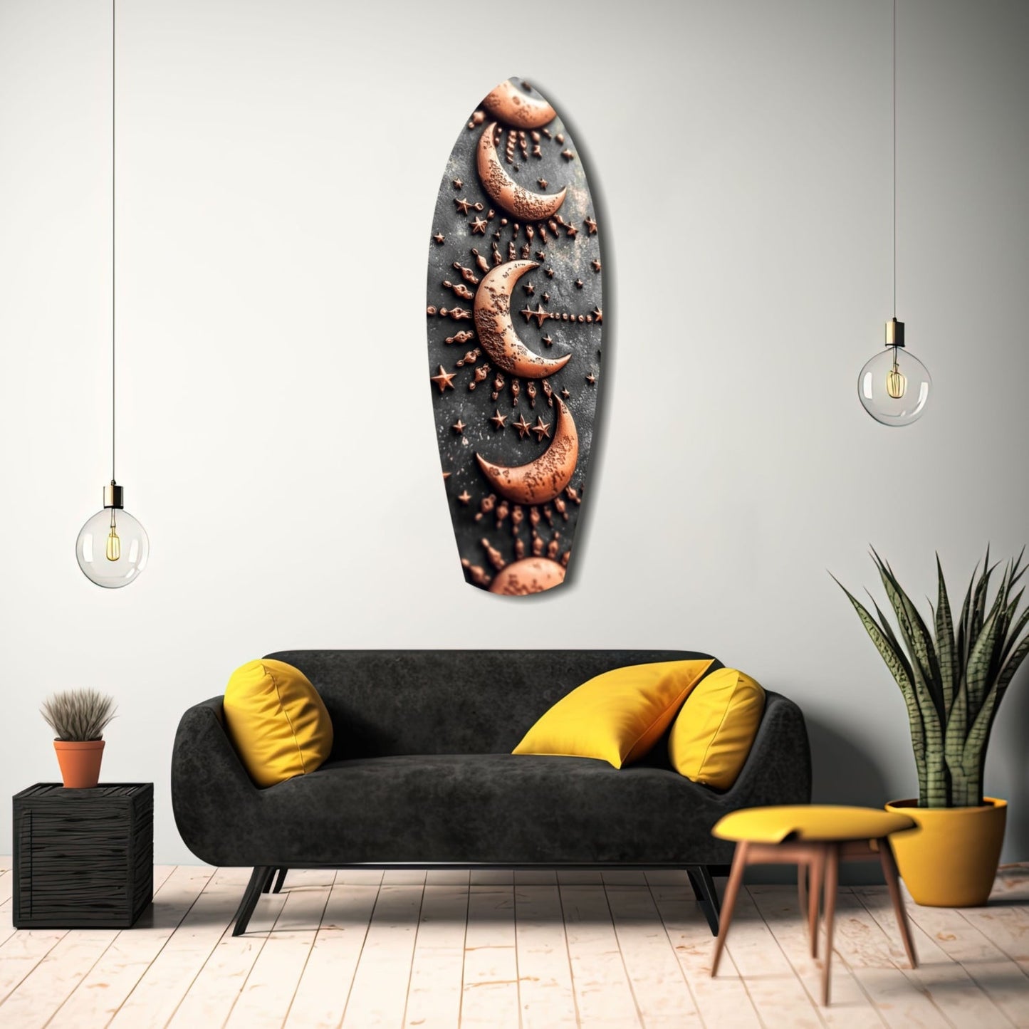 Black oval glass wall art with copper crescent moons and stars displayed above a charcoal sofa with yellow pillows in a modern living room setting.