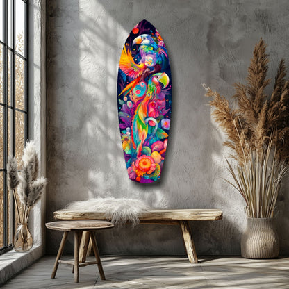 Colorful tropical glass wall art featuring vibrant parrots and flowers displayed above wooden bench in minimalist interior.