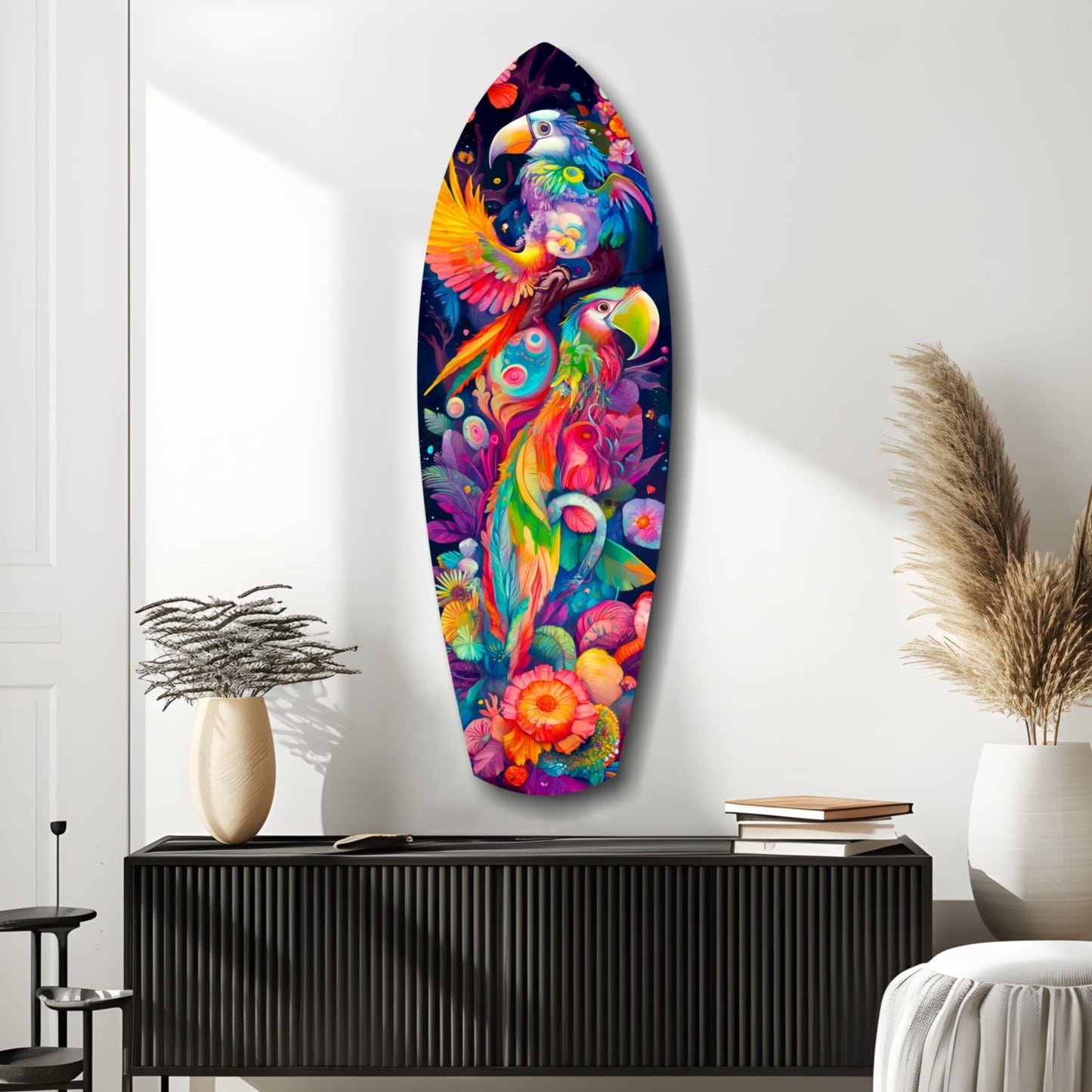 Colorful glass wall art featuring vibrant parrots and tropical flowers displayed above a black ribbed cabinet in a minimalist interior setting.