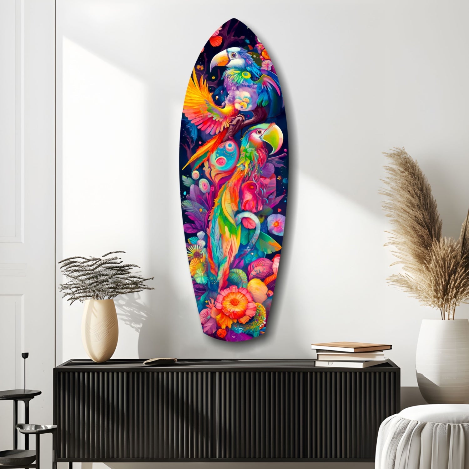 Colorful glass wall art featuring vibrant parrots and tropical flowers displayed above a black ribbed cabinet in a minimalist interior setting.