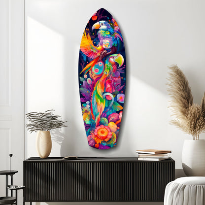 Colorful glass wall art featuring vibrant parrots and tropical flowers displayed above a black ribbed cabinet in a minimalist interior setting.