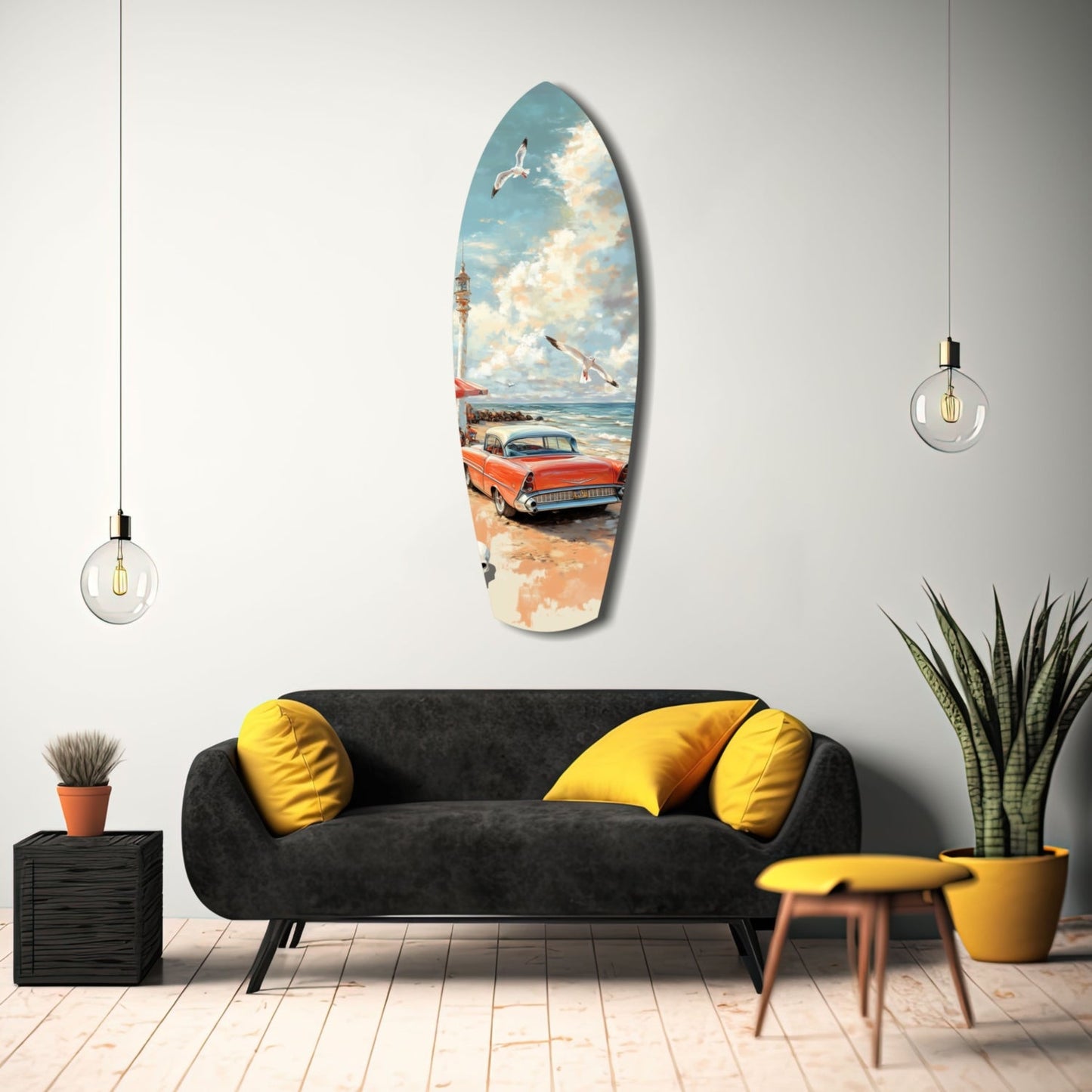 Surfboard-shaped glass wall art depicting a vintage red car on a beach with seagulls and blue sky, displayed above a black sofa with yellow pillows in a modern living room interior.