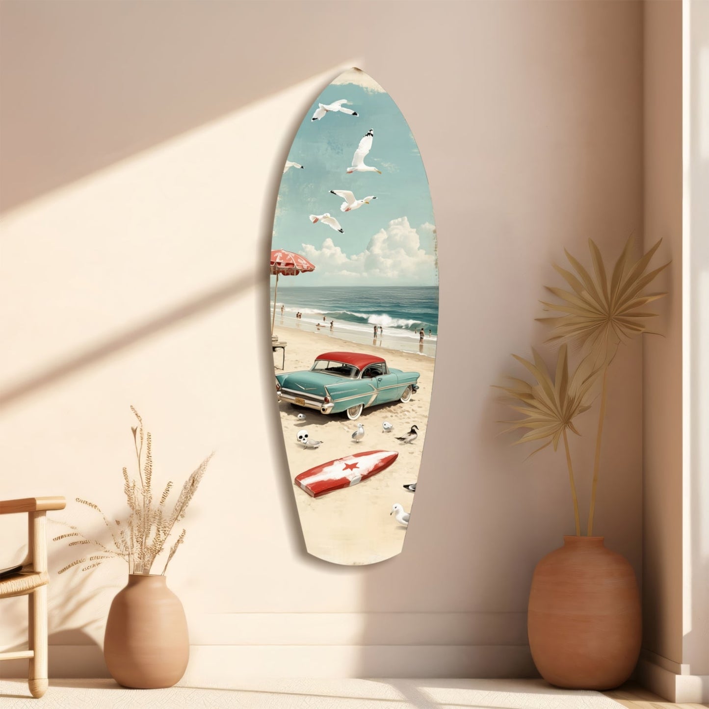 Surfboard-shaped glass wall art depicting a vintage beach scene with turquoise car, red umbrella, sailboat, and seagulls against cream wall.