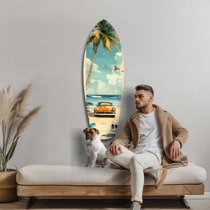 Man sitting on beige sofa with brown dog beside surfboard-shaped glass art featuring vintage car and palm tree beach scene.