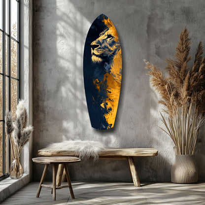Lion Pride V1 glass wall art in navy and gold displaying a lion's profile, mounted above a wooden bench in a minimalist room with pampas grass.