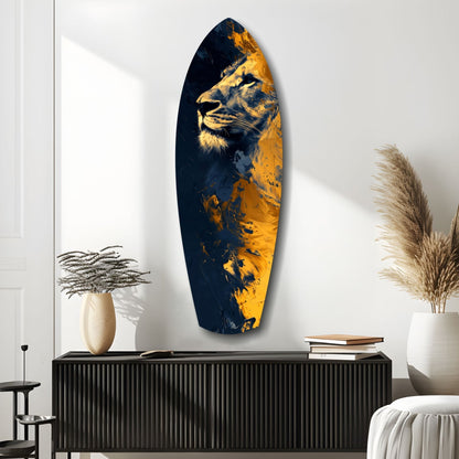 Lion Pride V1 glass wall art featuring a gold and navy blue lion head portrait mounted above a black console table in a minimalist interior.