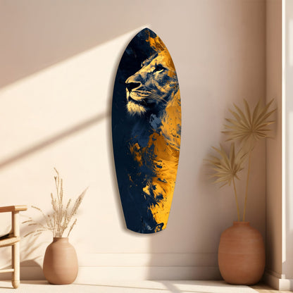Oval glass wall art featuring a lion's head in gold and navy blue tones, displayed on a beige wall with decorative dried plants in ceramic vases.