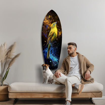 Man sitting on beige sofa beside small dog, with glowing yellow and blue bird glass art hanging on white wall above.