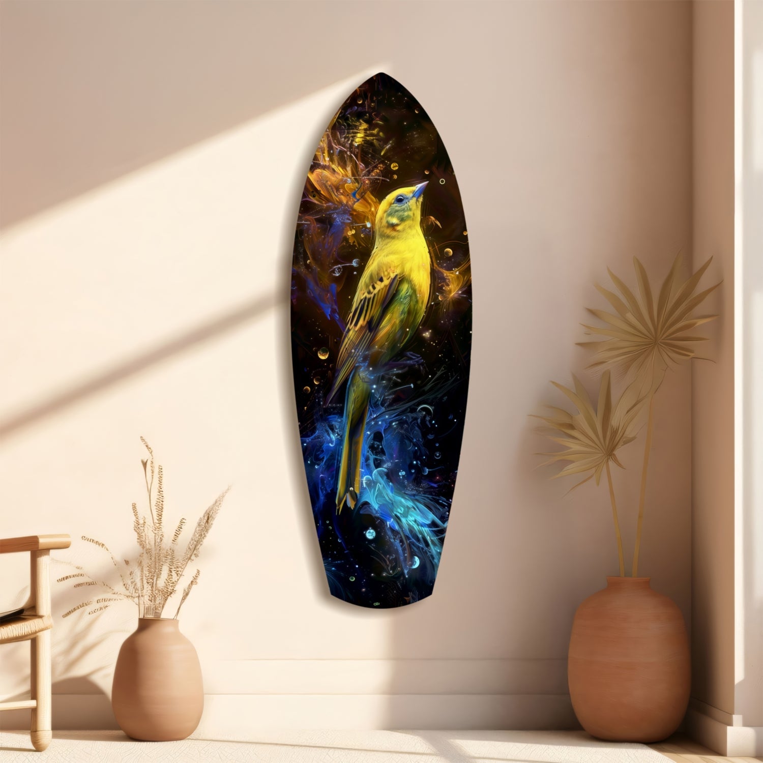 Yellow bird glass wall art with blue and gold cosmic background displayed on beige wall with dried flowers and terracotta vases.