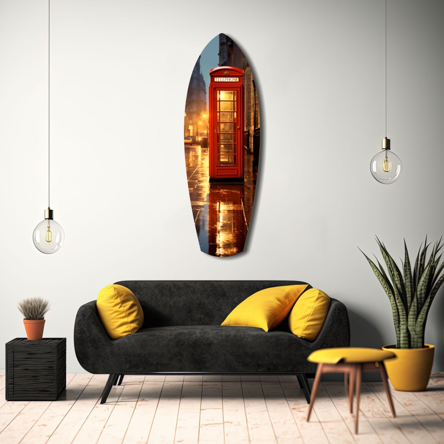 Elongated oval glass wall art depicting illuminated red British telephone booth at dusk, displayed above black sofa with yellow cushions in modern living room interior.