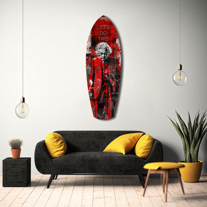 Red and black glass wall art with motivational text "LET'S DO THIS" displayed above black sofa with yellow pillows.