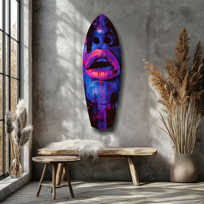 Vibrant neon glass wall art with hot pink lips and purple face displayed in minimalist room with wooden bench and dried pampas grass.