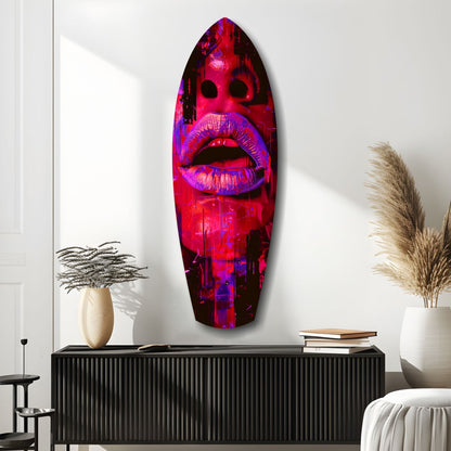 Vibrant neon pink and purple lips glass wall art displayed above a black ribbed console in a minimalist modern interior.