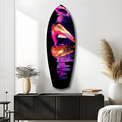 Vibrant neon lips glass wall art displayed vertically above black cabinet in modern interior setting with decorative vases.